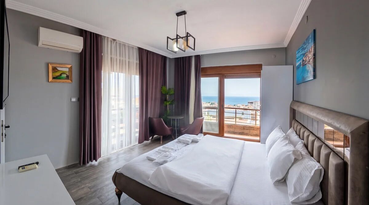 Quarto superluxo, vista para o mar | Roupas de cama premium, roupa de cama