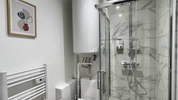 Hair dryer, towels, soap, shampoo