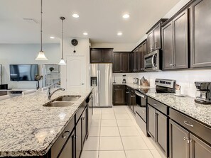 Fridge, microwave, oven, stovetop - Reunion Dream Home: Private Pool, Near Theme Parks! (Orlando)