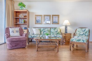 Flat-screen TV, DVD player, books, stereo