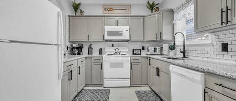 Condo, 2 Bedrooms | Private kitchen | Fridge, oven, coffee/tea maker, toaster