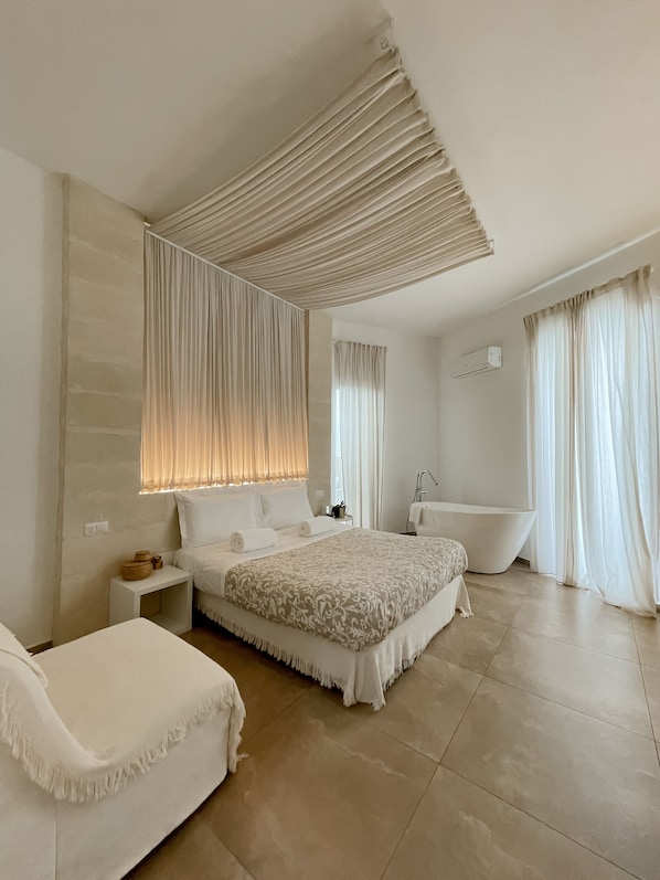 Habitació júnior | Llençols de cotó egipci, roba de llit d'alta qualitat i cobrellits