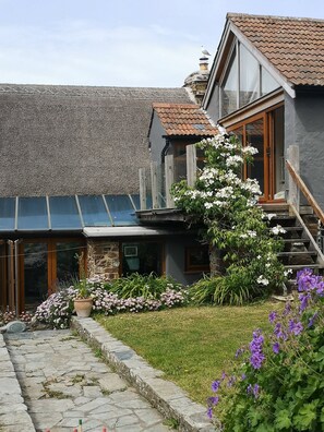 Exterior detail - 16th century thatched cottage with swimming pool, driect access onto beach path (Croyde)