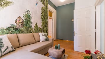 Departamento Gallery | Área de sala de estar | Televisión de pantalla plana