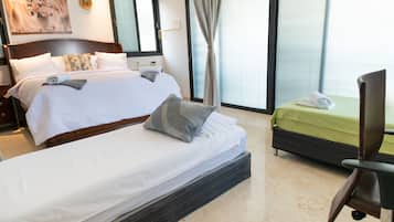 Premium bedding, memory-foam beds, individually decorated, desk