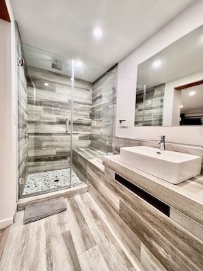 Shower, hair dryer, towels, soap