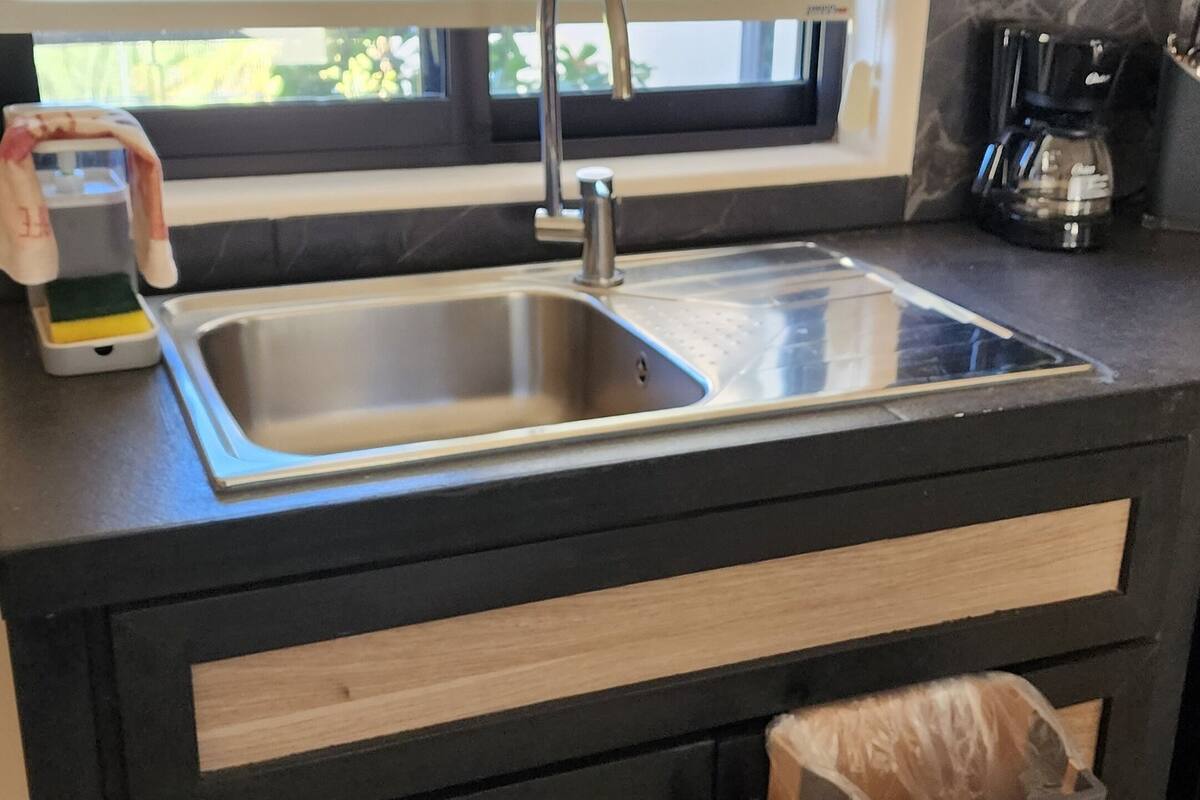 mini-fridge, microwave, stovetop, coffee/tea maker