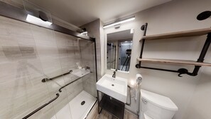 Regadera, secadora de cabello, toallas 