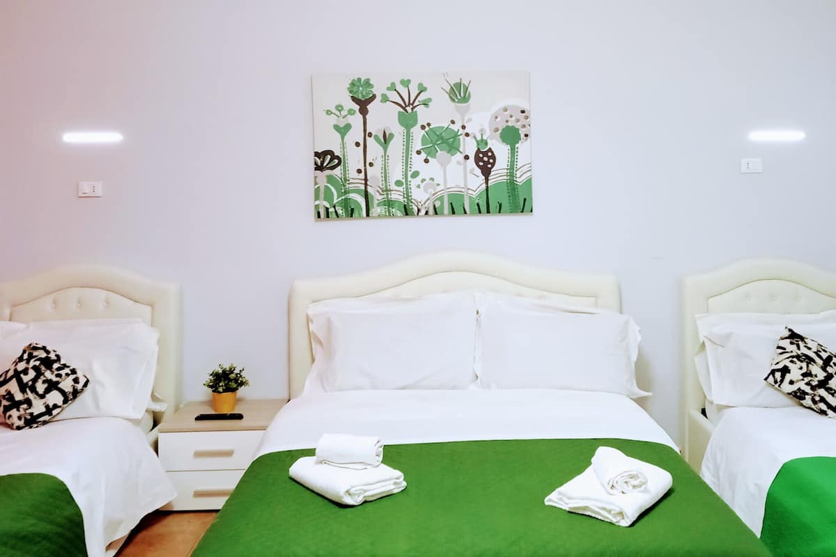 Family Room | Minibar, in-room safe, WiFi (free)