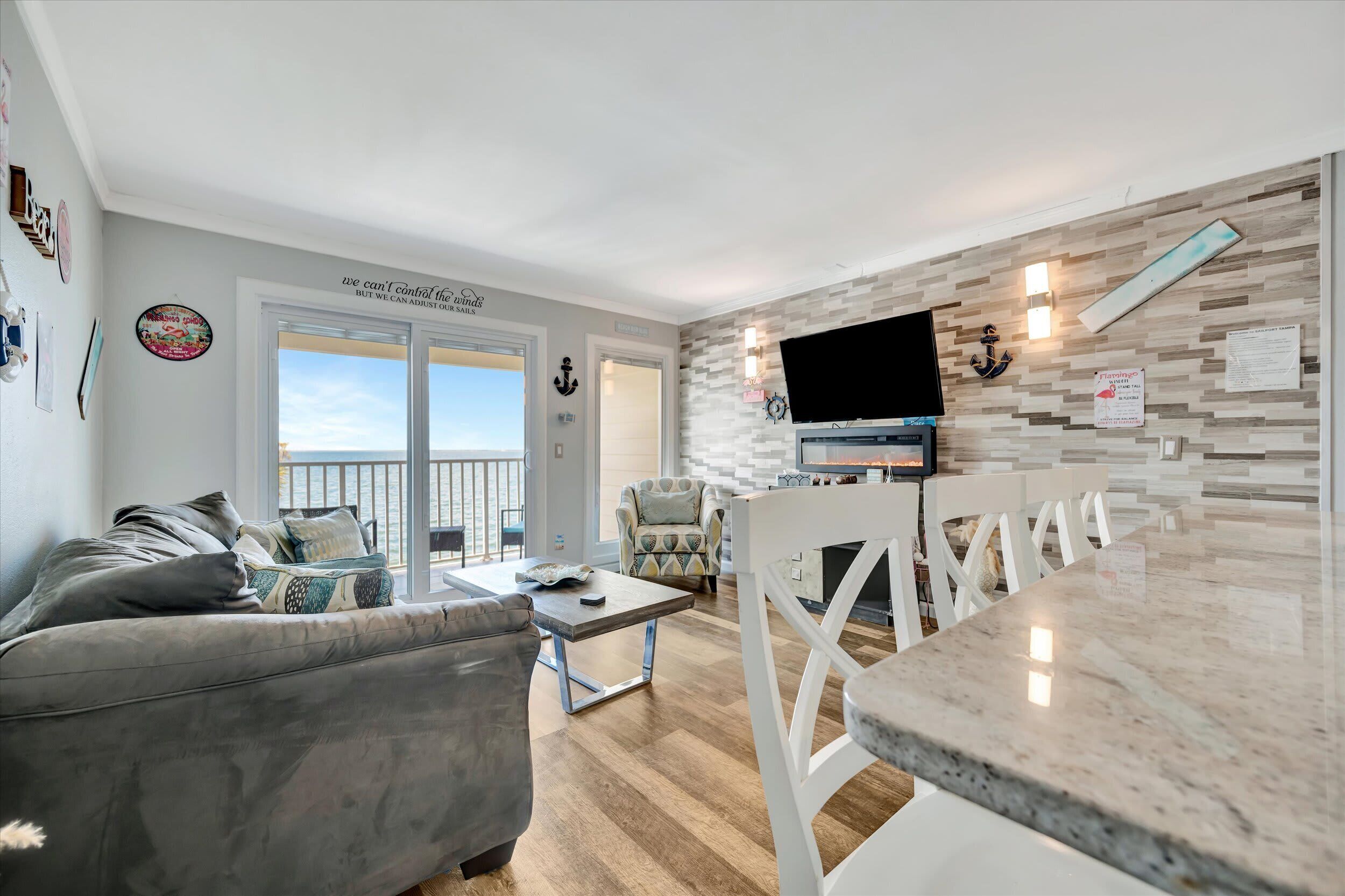 Panoramic Apartment, Fireplace, Bay View | Living area | 55-inch Smart TV with digital channels, TV