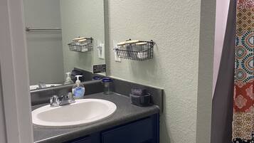 Bathtub, hair dryer, towels