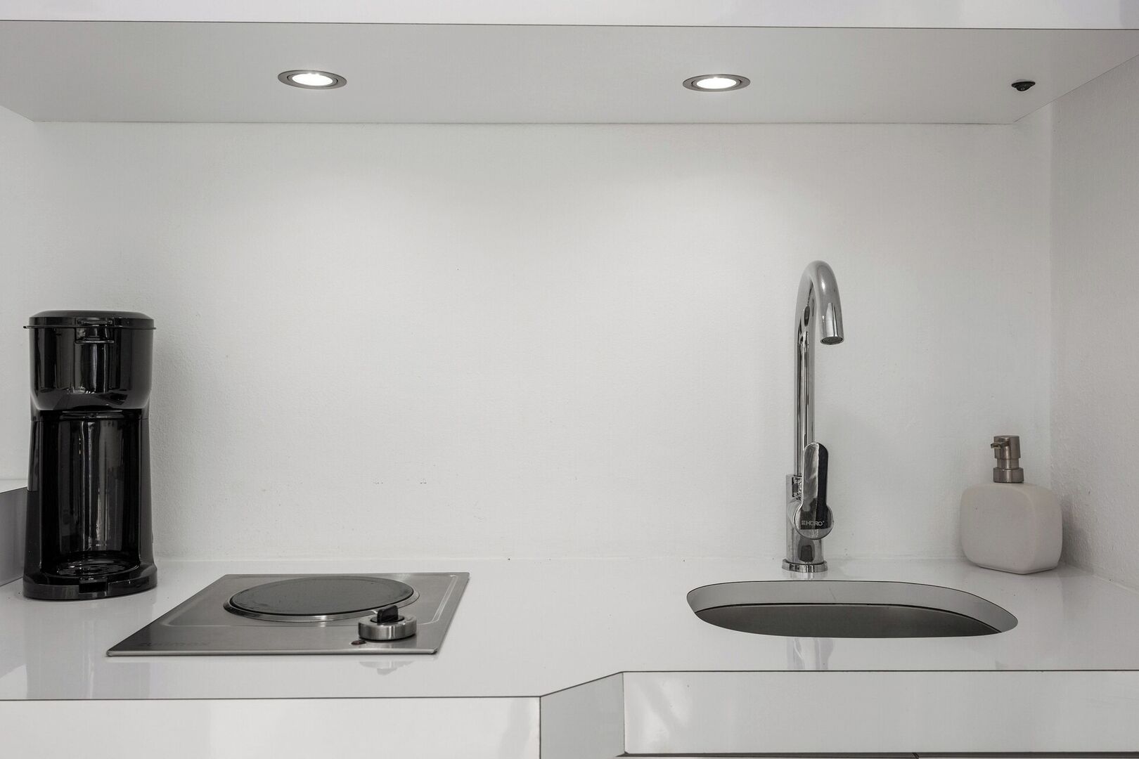 Microwave, stovetop, coffee/tea maker, cookware/dishes/utensils