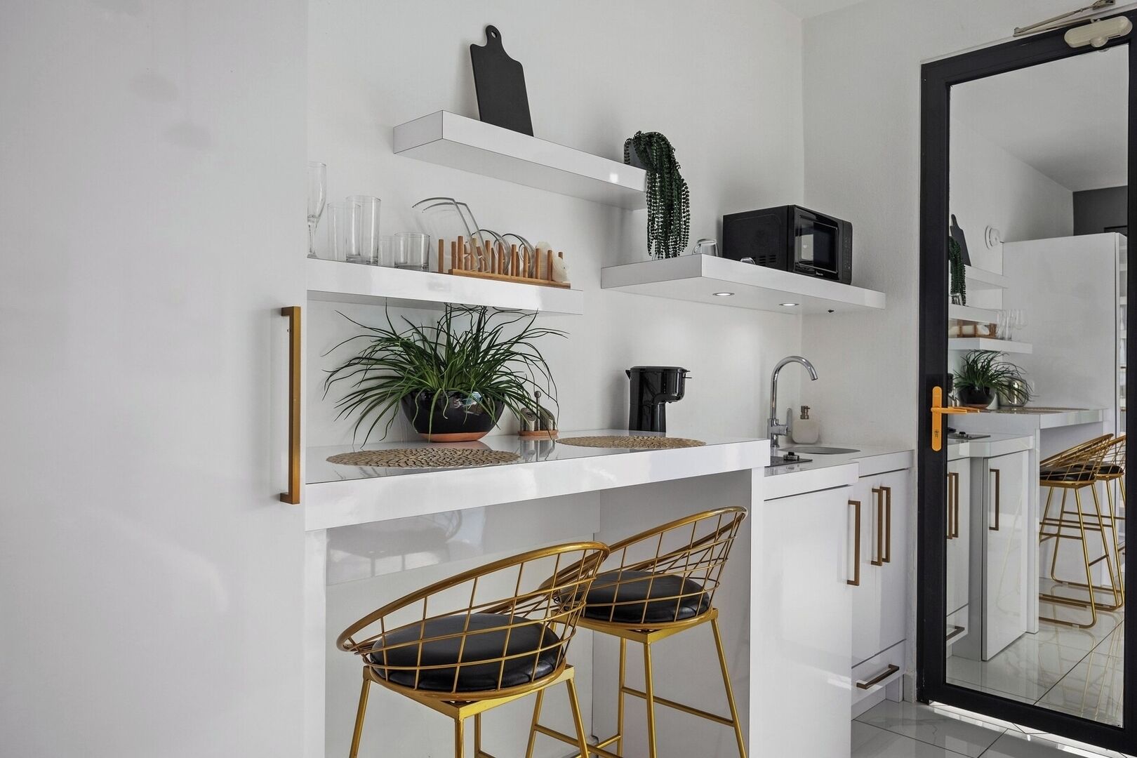 Fridge, microwave, stovetop, coffee/tea maker