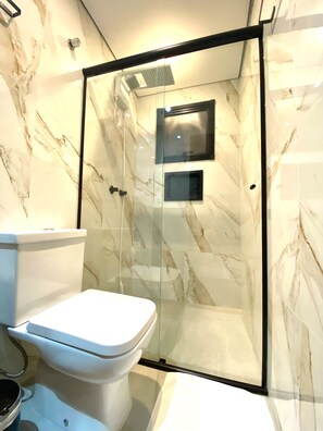 Shower, hair dryer, towels, soap