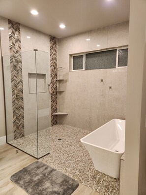 Shower, hair dryer, towels, soap