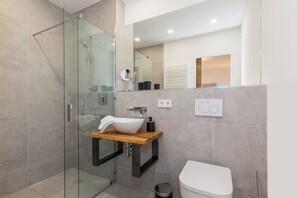 Bathtub, hair dryer, towels