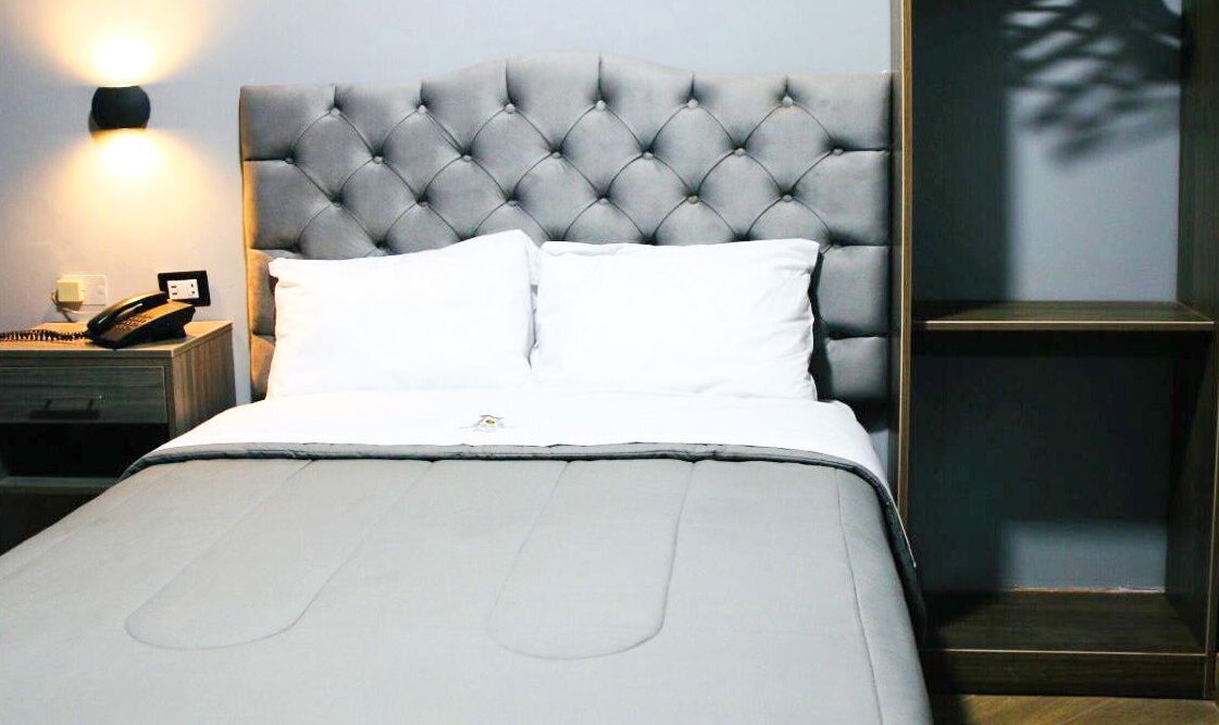 Desk, laptop workspace, free WiFi, bed sheets