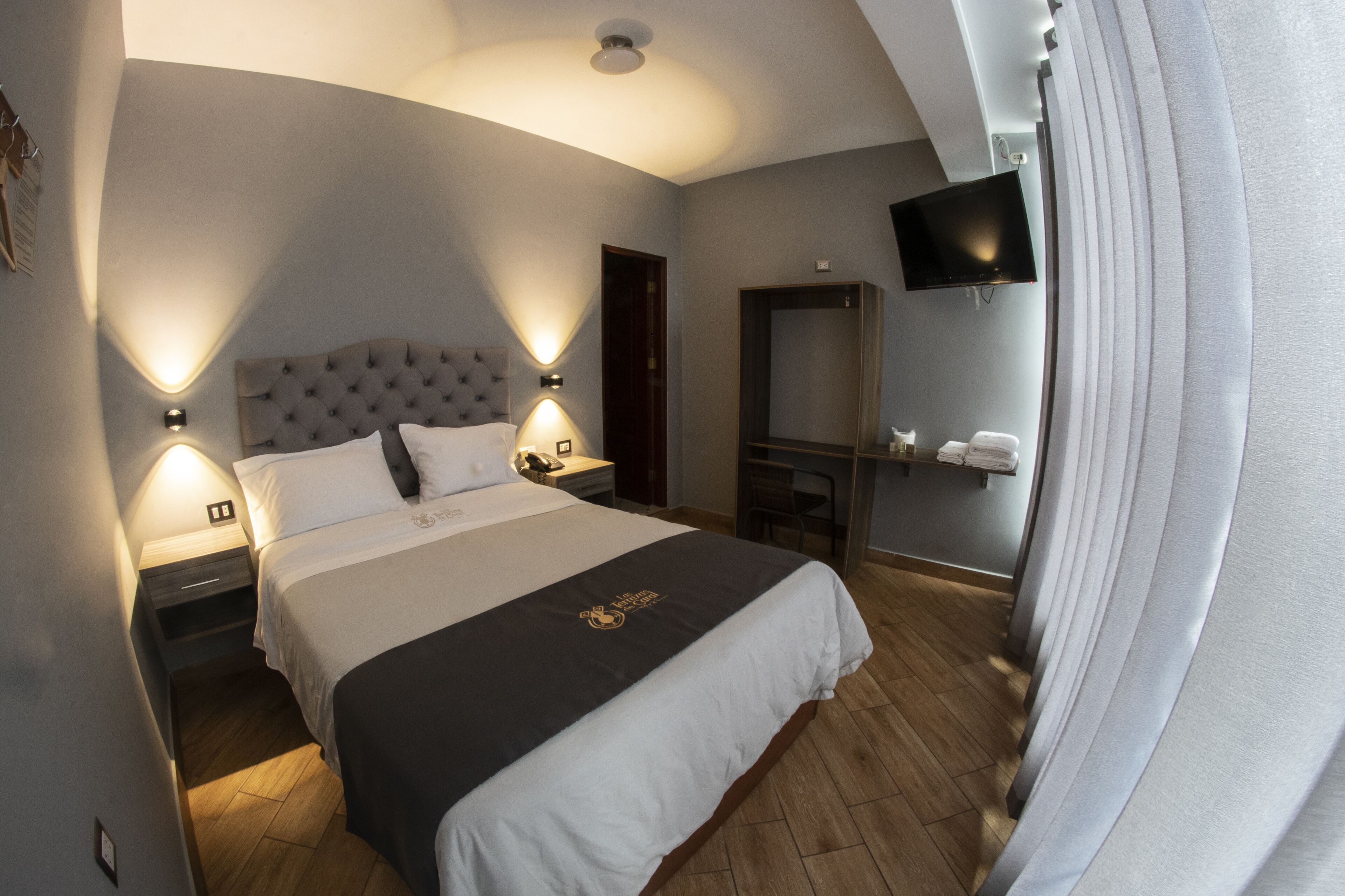 Desk, laptop workspace, free WiFi, bed sheets