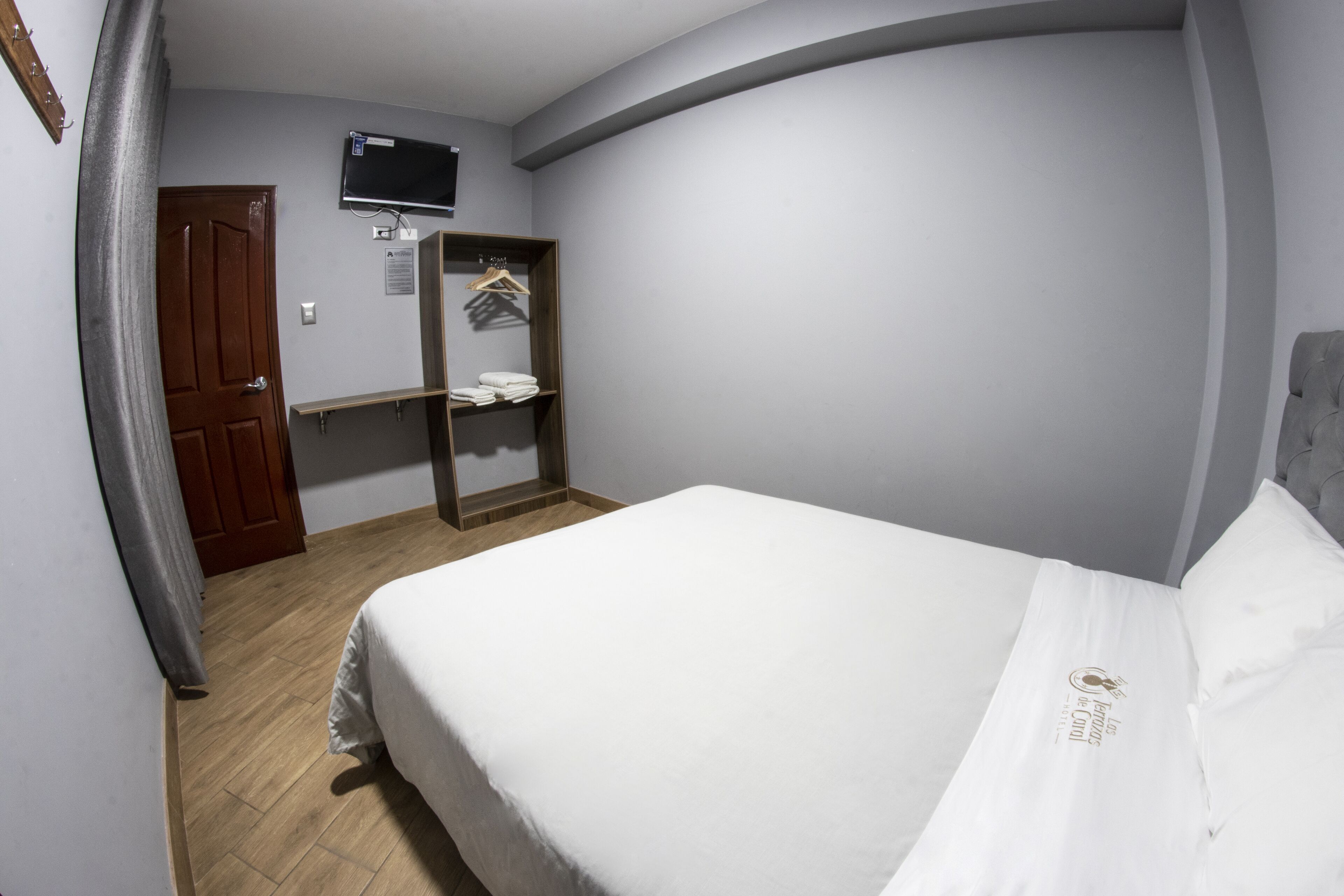 Desk, laptop workspace, free WiFi, bed sheets