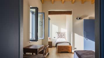 Habitación cuádruple de lujo | Ropa de cama hipoalergénica y edredón