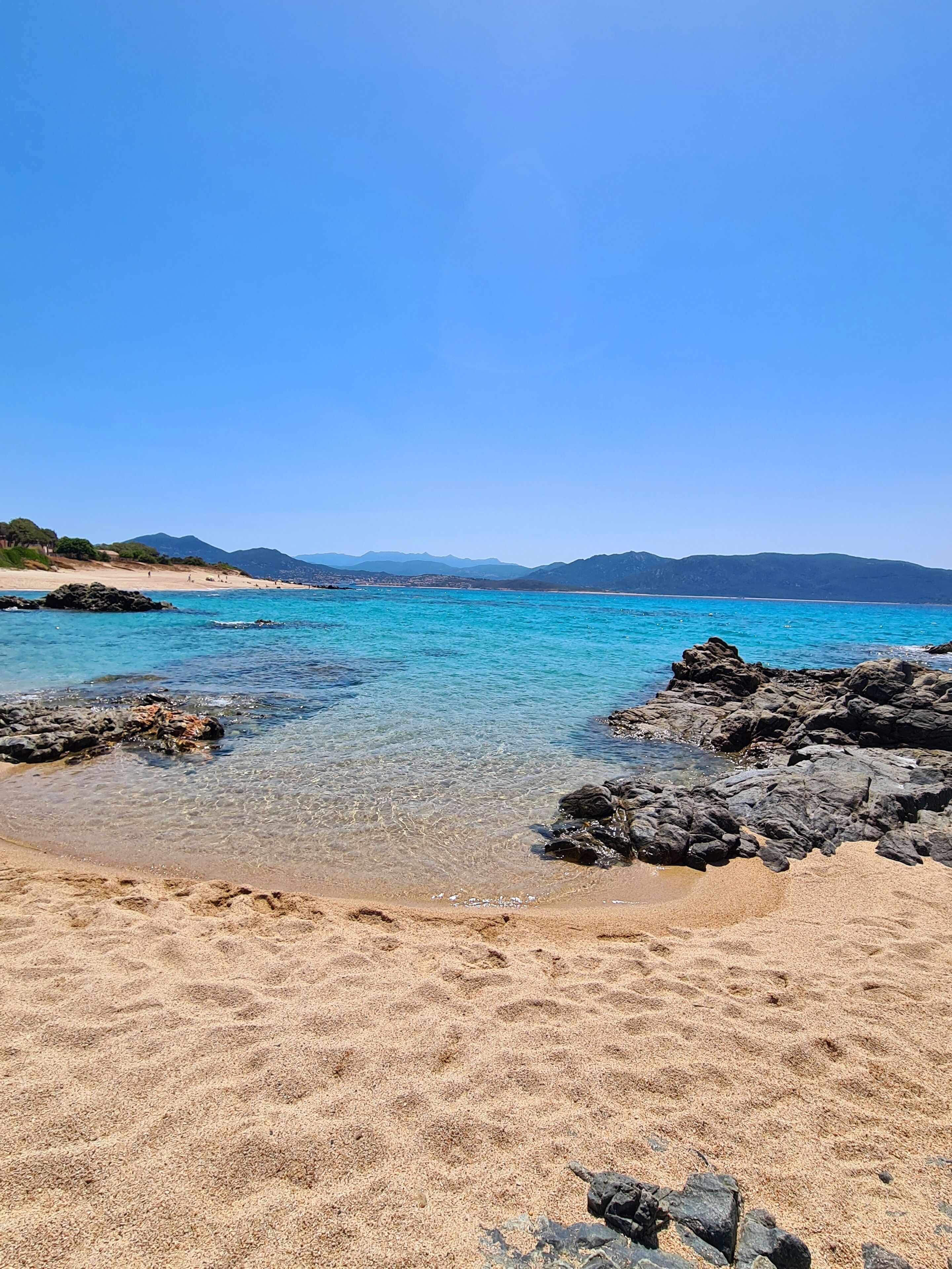 On the beach, sun loungers