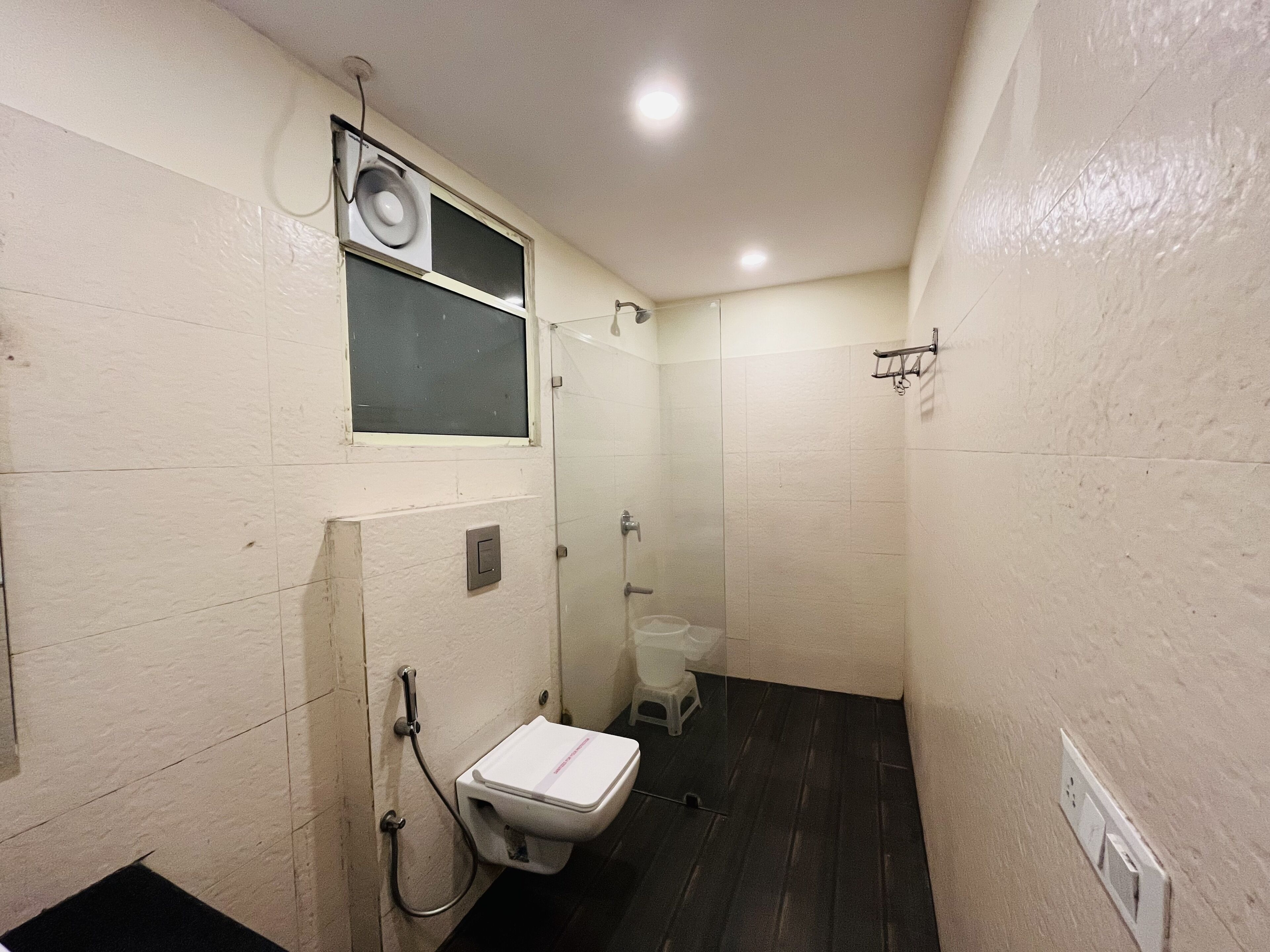 Shower, rainfall showerhead, towels, soap