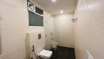 Shower, rainfall showerhead, towels, soap