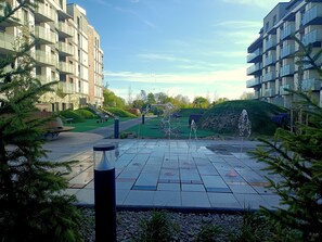 Property grounds - Family apartment, playground, parking lot. (Kołobrzeg)