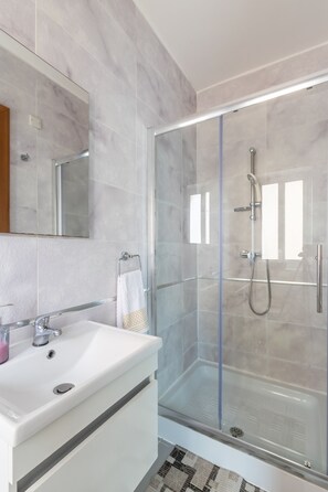 Hair dryer, towels, soap, shampoo