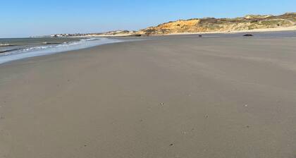 PANORAMIC sea, dunes and golf view apartment