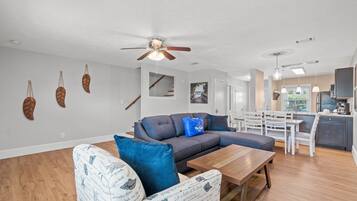 Cottage, Multiple Beds, Balcony, Garden View (120 Palm Beach Dr A) | Living area | 40-inch TV with digital channels
