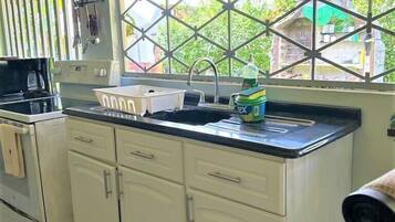 Departamento superior | Cocina privada | Cafetera y tetera, tetera eléctrica y comedor