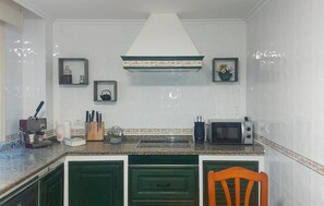 Microones, forn, placa de cuina i rentaplats 