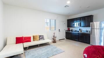 Business Apartment | Living area | 55-inch Smart TV with digital channels, TV, Netflix