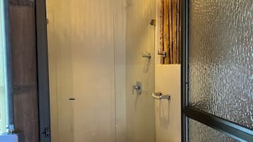 Shower, jetted tub, towels, soap