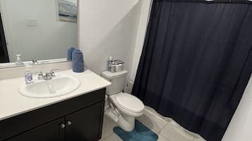 Hair dryer, towels, soap, shampoo