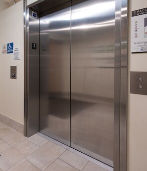 Full-sized elevator servicing all floors including the Roof Terrace.