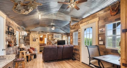 The Desperado Inn is a charming secluded cabin with Mountain Fork River access