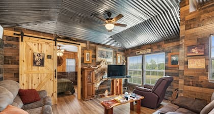 The Desperado Inn is a charming secluded cabin with Mountain Fork River access