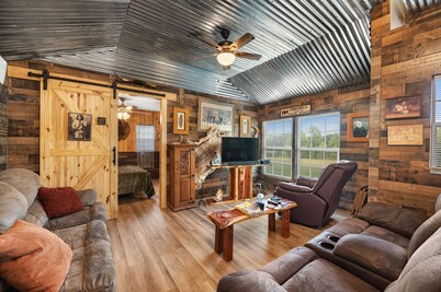 The Desperado Inn is a charming secluded cabin with Mountain Fork River access