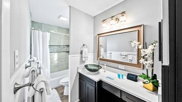 Hair dryer, towels, soap, shampoo