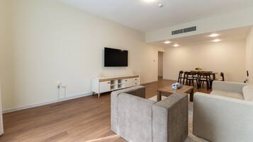 Apartment | Living area | 50-inch LED TV with digital channels