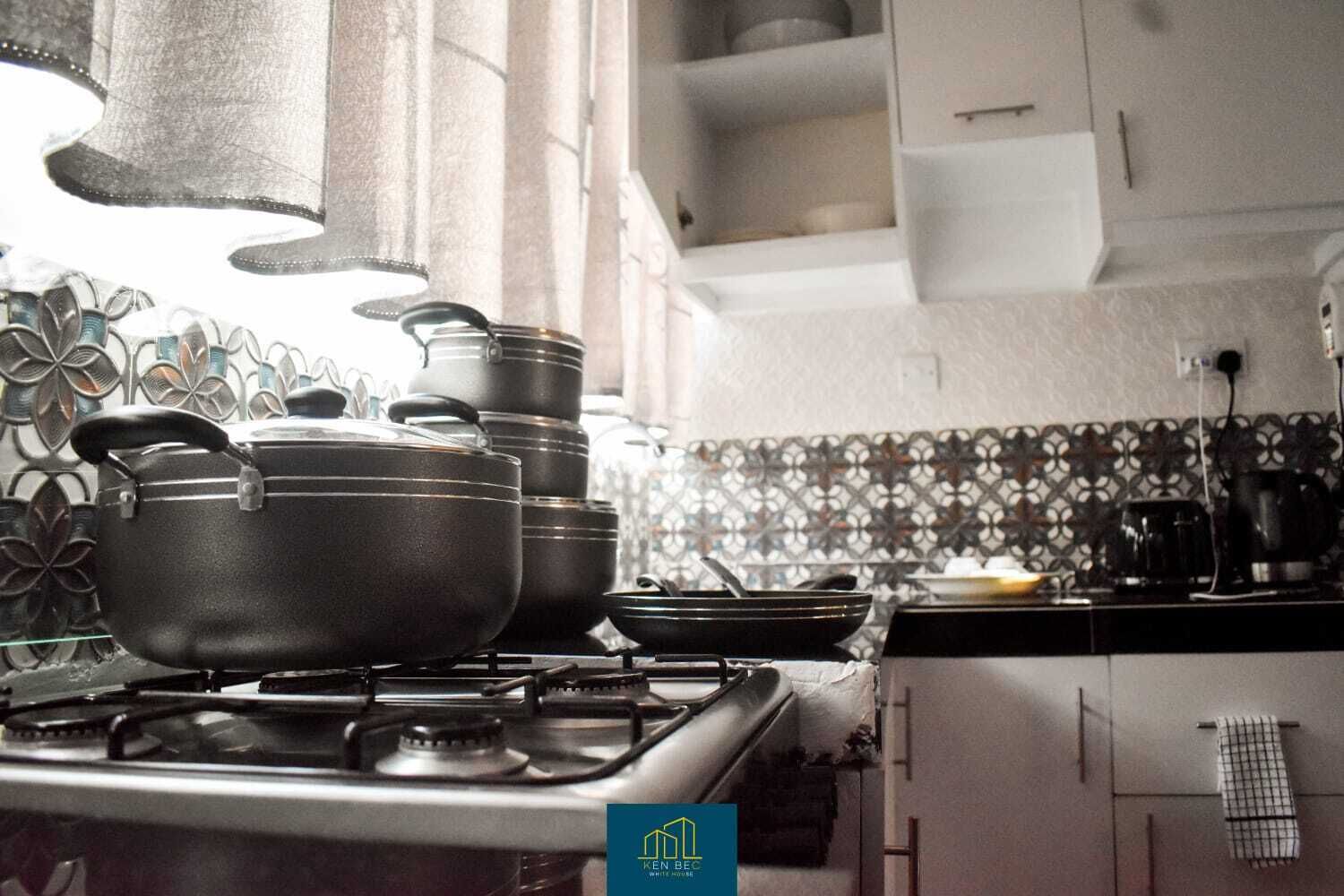 Casa, 2 camas Queen size | Cocina privada | Refrigerador, microondas, horno y parrilla de estufa 