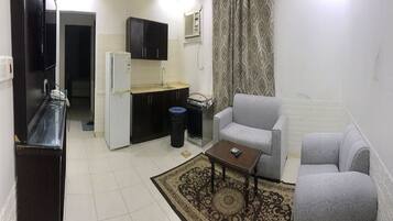 Familienapartment | Essbereich im Zimmer