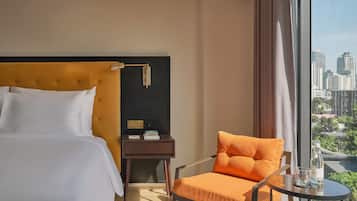 Premium bedding, down comforters, pillowtop beds, minibar