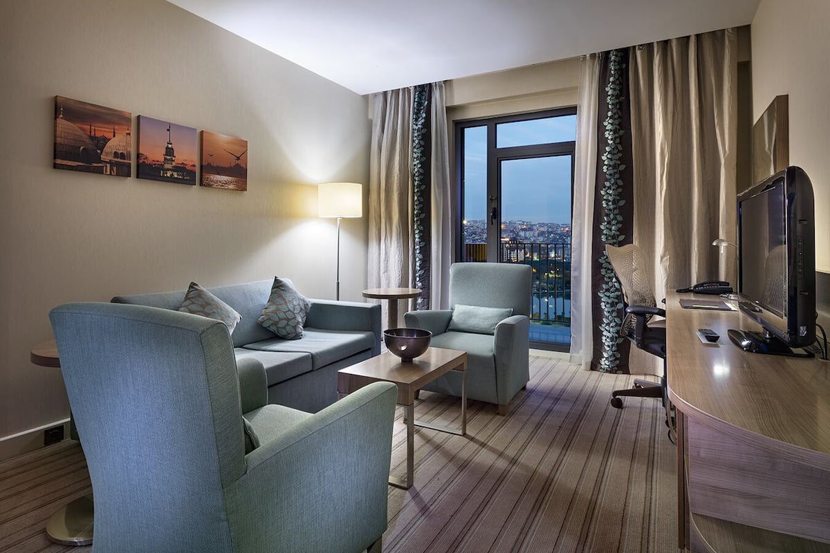 King Suite with Sea View | 2 bedrooms, premium bedding, minibar, in-room safe