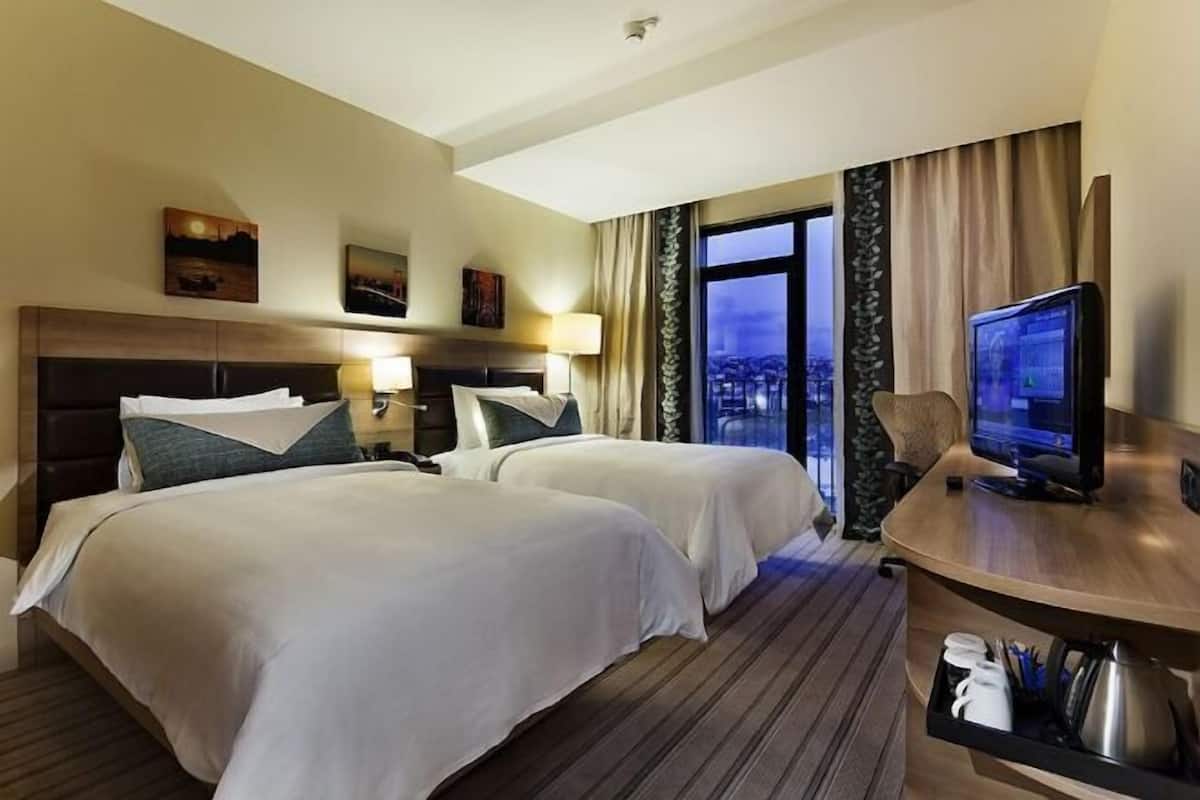 2 slaapkamers, luxe beddengoed, een minibar, een kluis op de kamer