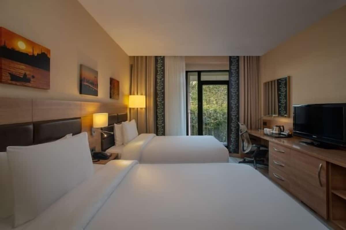2 slaapkamers, luxe beddengoed, een minibar, een kluis op de kamer