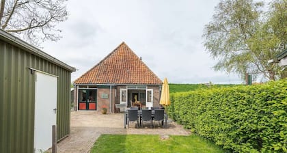 Characteristic farmhouse on the dike
