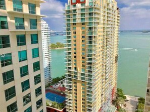 Located on the waterfront, this high-rise building offers stunning views of the surrounding cityscape.
